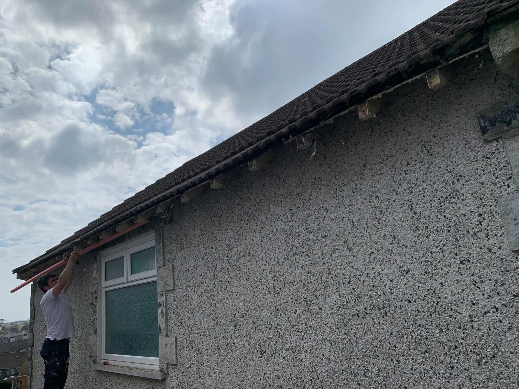 Chimney repair and repointing work - restored pointing and secure flashings on exposed chimney stack